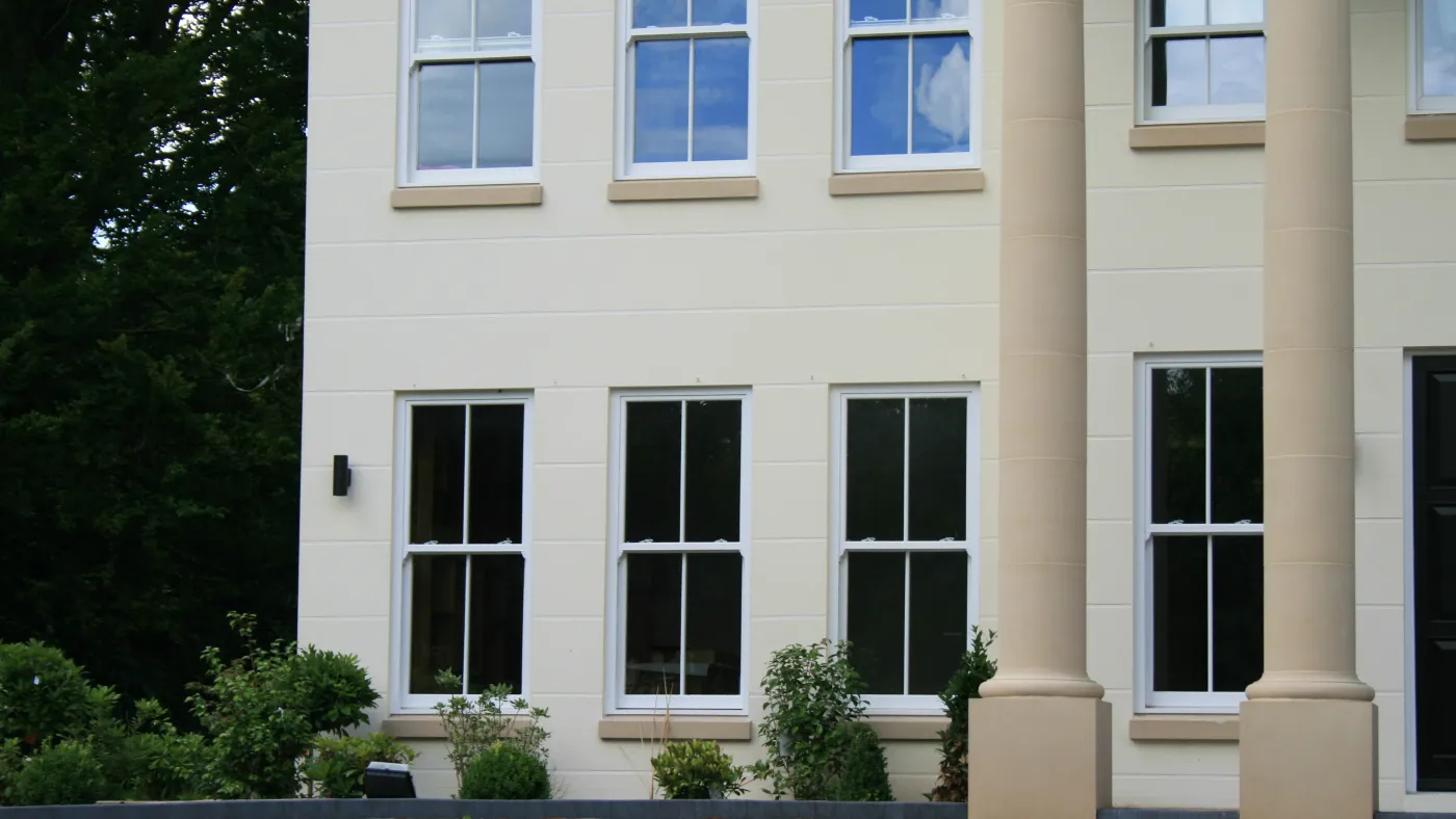 White sash windows on white rendered period property, Gerrards Cross