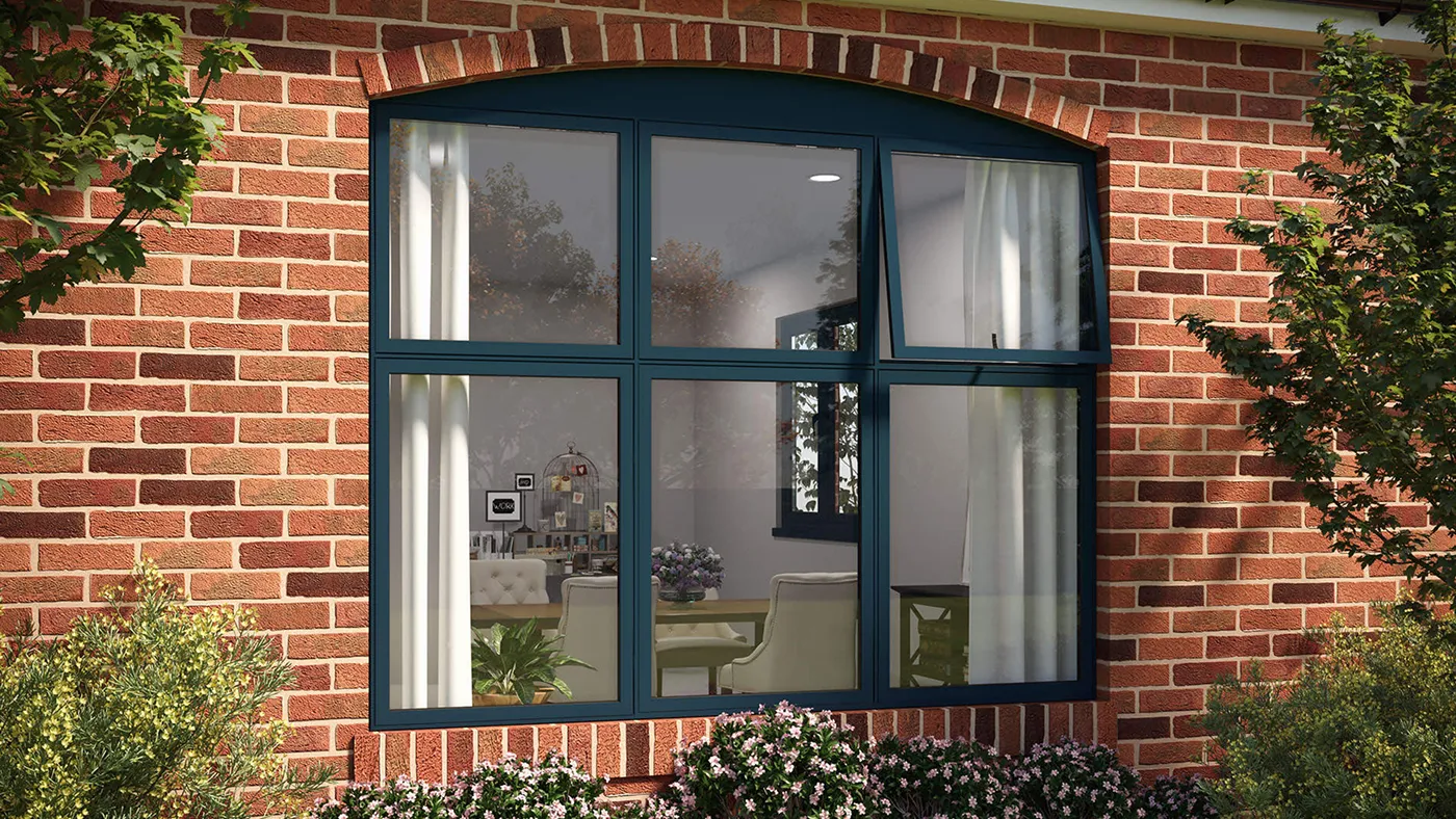 Anthracite grey flush windows with arched head on red brick property, Beaconsfield