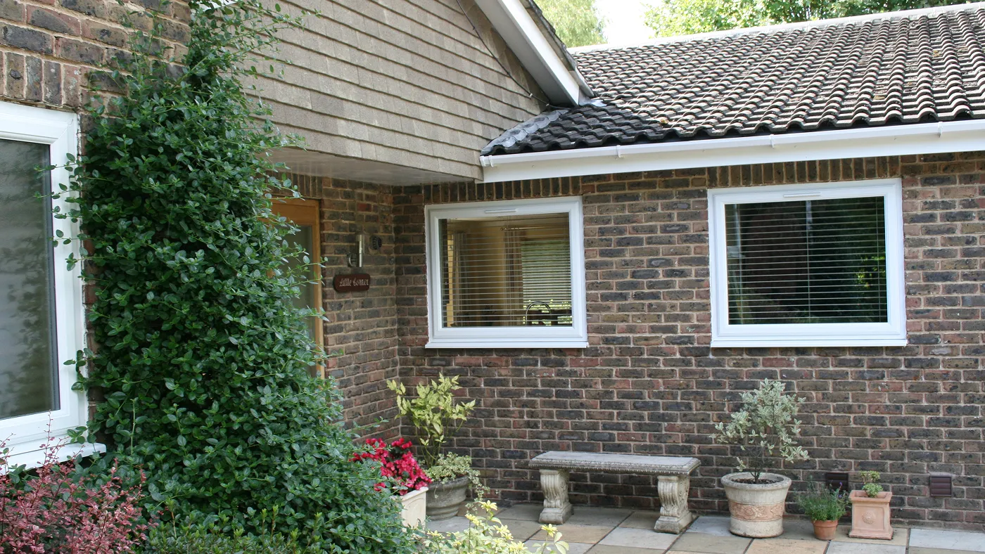 White tilt and turn windows on brick bungalow, Farnham Royal