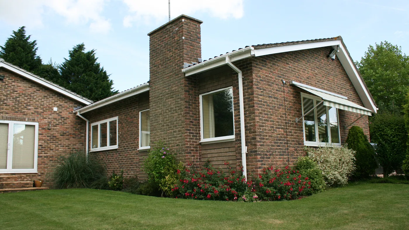 White tilt and turn windows on brick bungalow, Farnham Royal